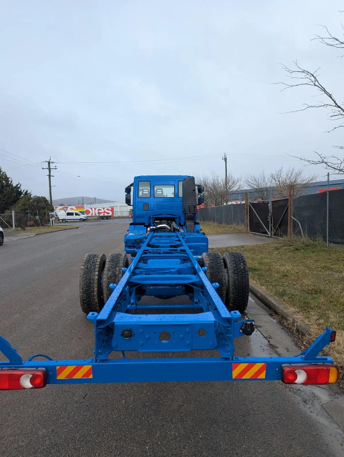 Truck cab chassis with the chassis rails painted blue